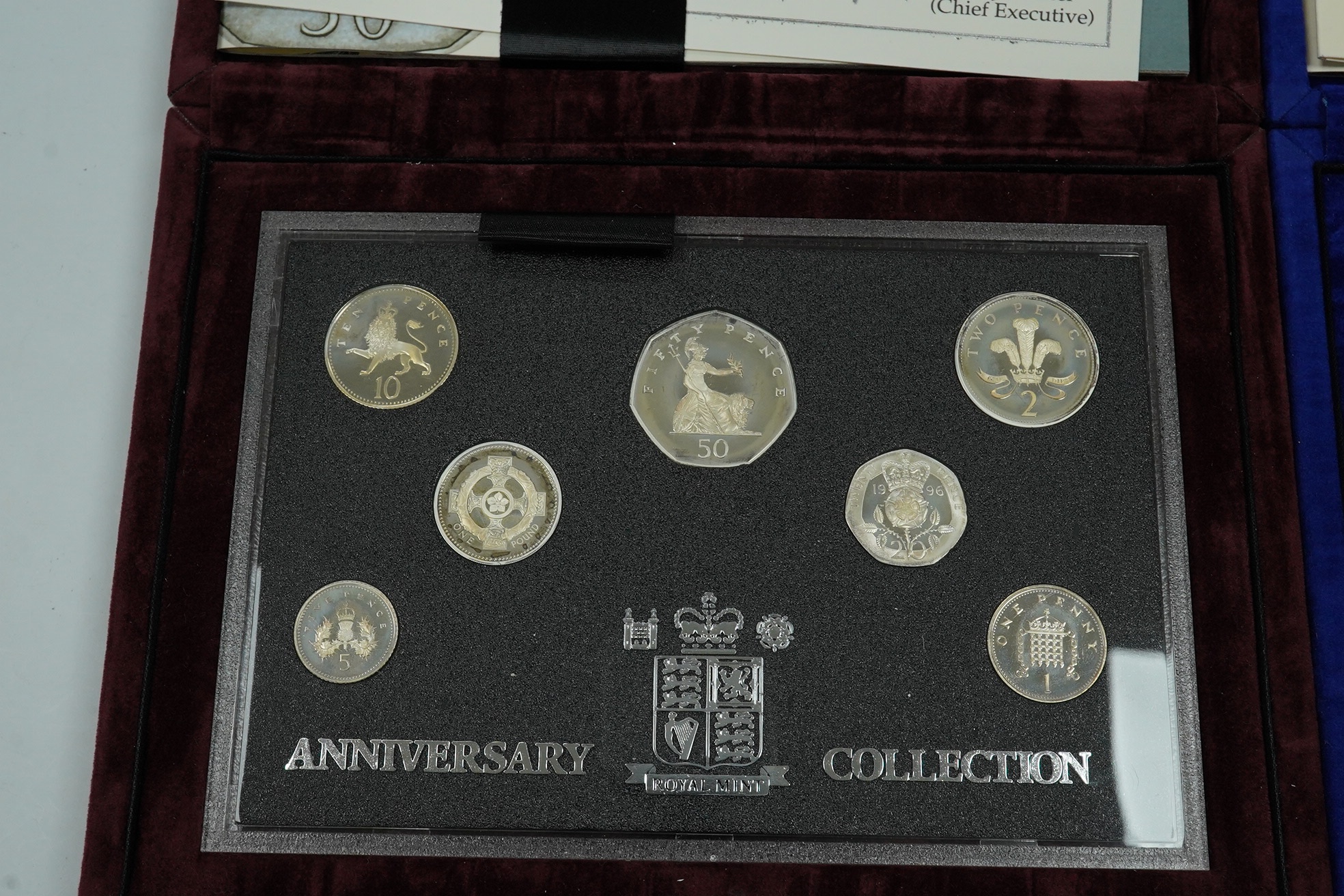 Royal Mint UK QEII coins, the Millennium Silver collection, 2000, in case of issue with certificate and Silver Anniversary collection 1996, in case of issue with certificate (2 cases)